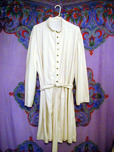 Mans coat, appropriate for most Islamic regions prior to the 17th century. White raw silk, buttons up front, sash included. Size, large.
Cost: \\$90 plus shipping